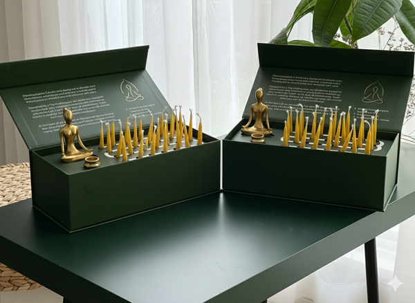 The Couples 28-Day Meditation Journey: two open kit boxes side by side, each with a brass figure and candles
